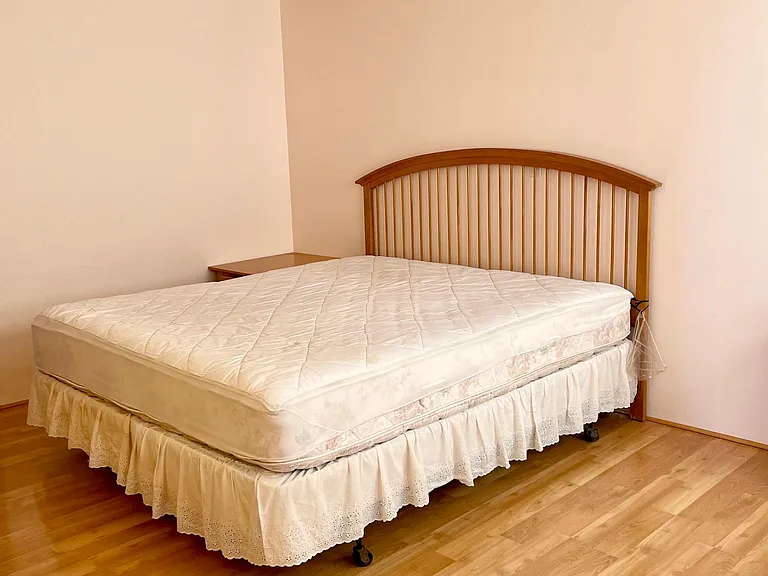 Spacious primary bedroom with ocean, golf course, and Diamond Head views.