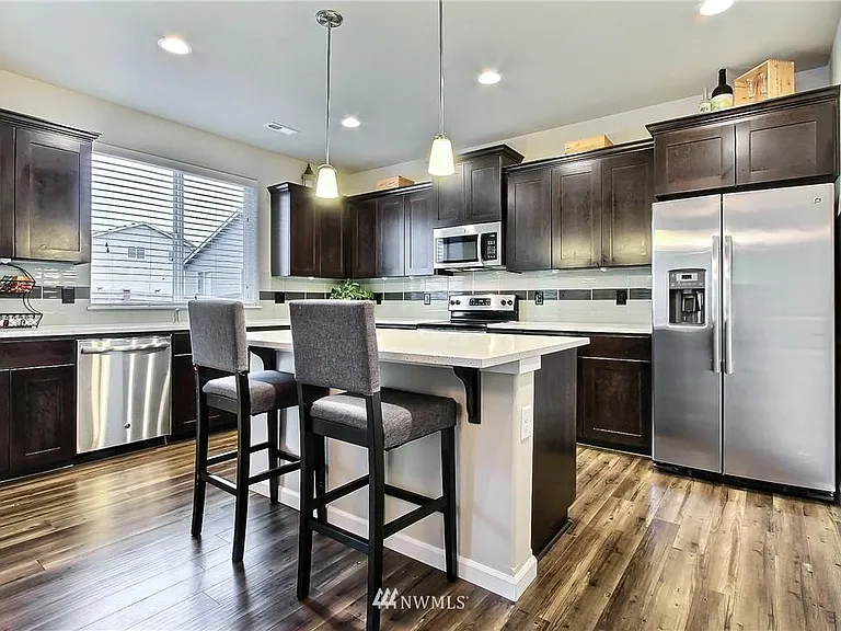 7412 Munn Lake Dr SE — Photo 1