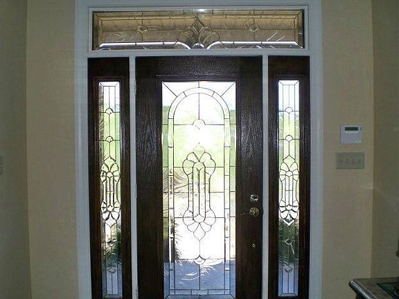 Front door with clear stained glass panels