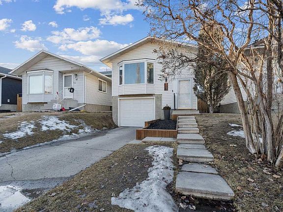 3rd image of 65 E Tararidge Close NE