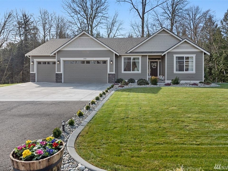 Welcome Home to this stunning Rambler with a basement on 1+ acre.   Curb appeal is everything!