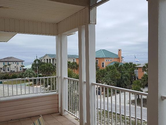 Porch View East toward neighborhood beach access.