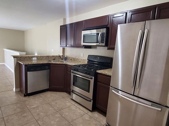 Gas stove, stainless steel applicances and Granite countertops