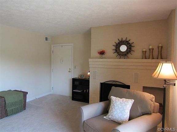 Warm & inviting with wood burning fireplace