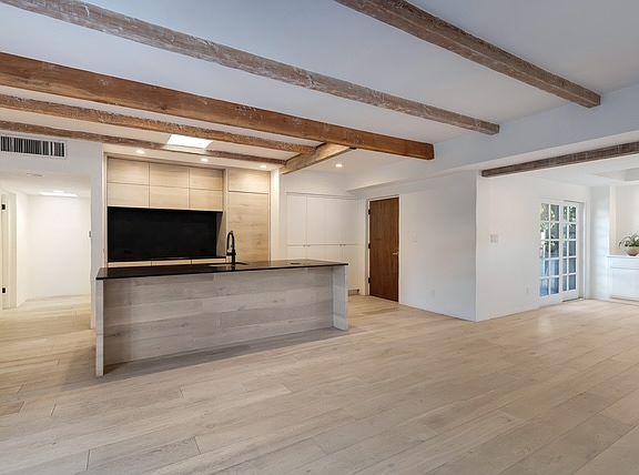 Open kitchen, living and dining areas