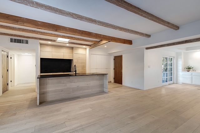 Open kitchen, living and dining areas