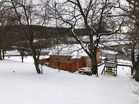 Large yard with fenced in back area