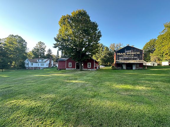 view from lake looking towards barn and shop