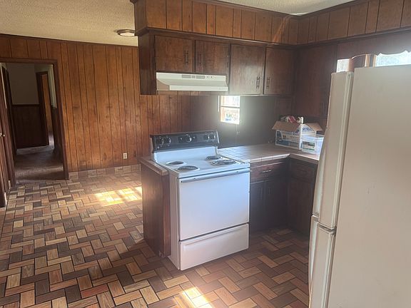Kitchen with adjoining brakfast room.