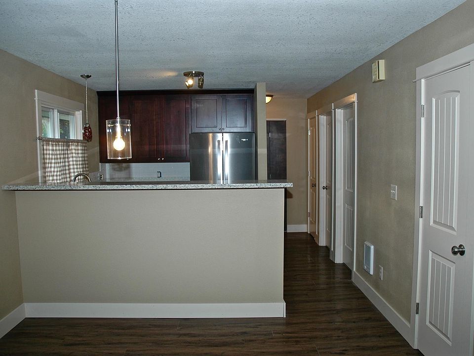 Dining with Bar Next to slider with coat closet. 