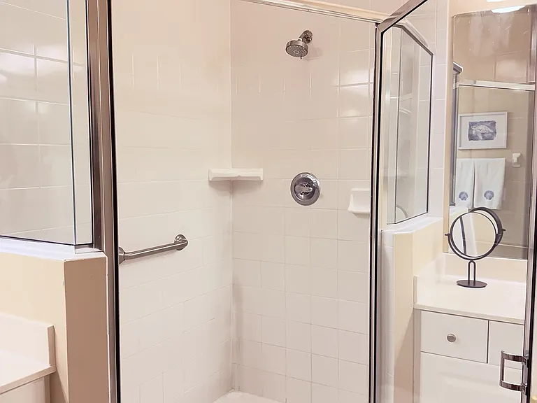 Main bathroom step in shower, dual sinks