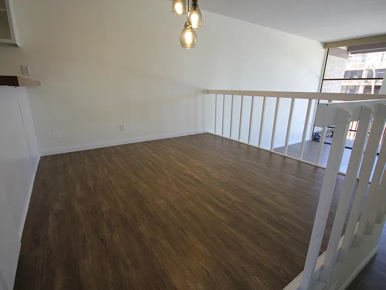 Spacious Dining Area overlooking Stepdown Livingroom!
