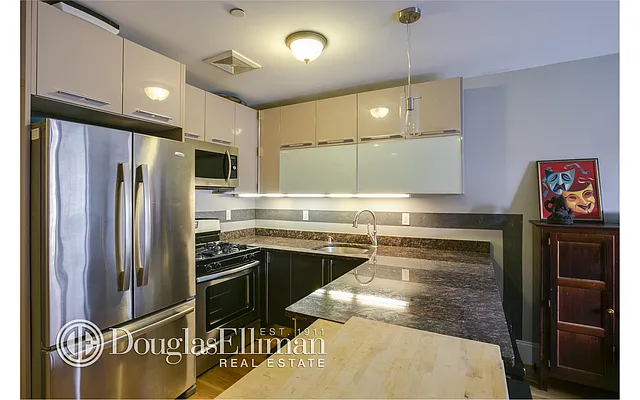 Sold by Douglas Elliman | media 17