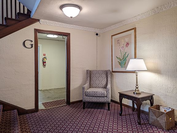 Common area of building with lounge chair