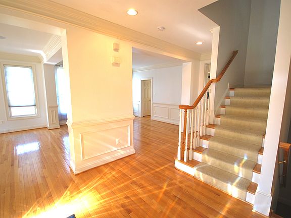Entrance hallway looking into formal dining and living space