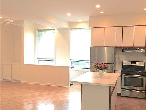 open concept main-floor with kitchen/living/dining space