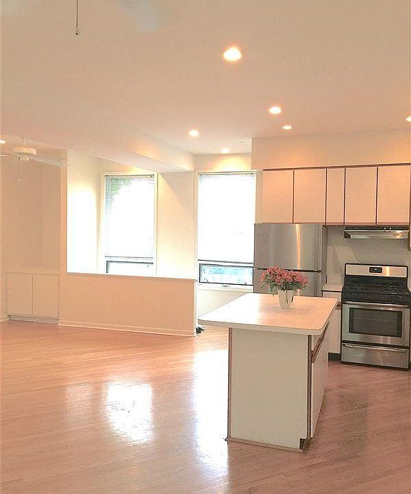 open concept main-floor with kitchen/living/dining space