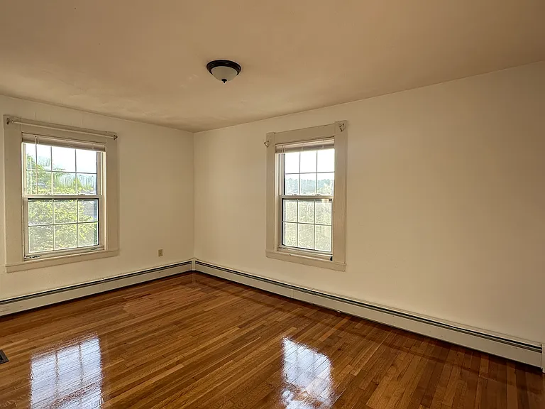 Generous primary bedroom with dedicated closet