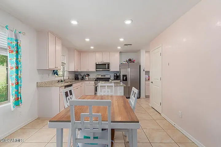 8216 W Albeniz Pl — Photo 6