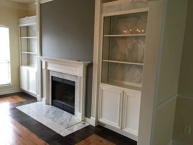 Fireplace and book shelves