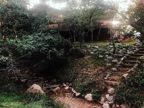 Situated on Sutherland Creek so you can hear the water when you open a window.