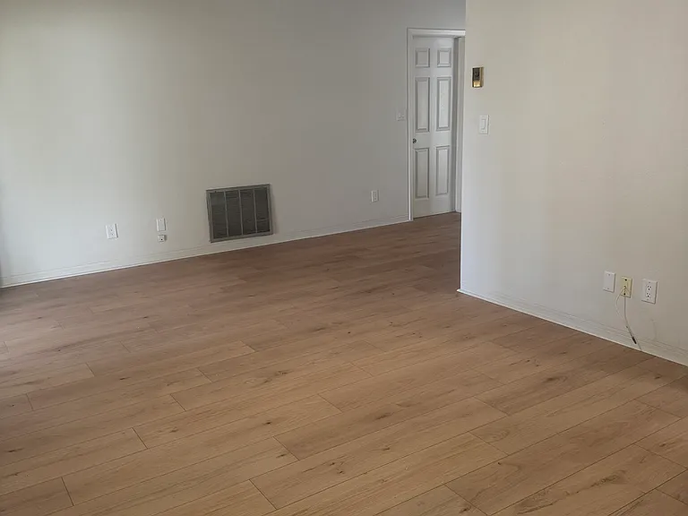 living room with view into dining area
