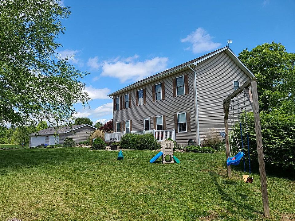 Main view of home and garage
