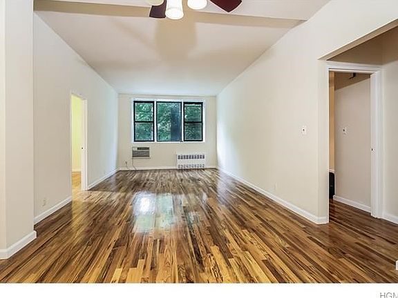 Welcome to your junior 4 co-op featuring the living room with gleaming hardwood floors.