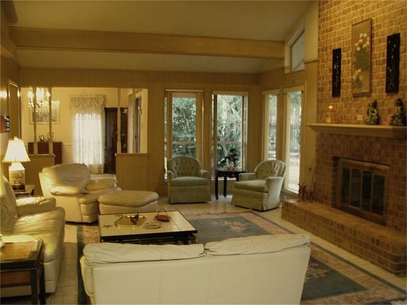 Family room with center wall fireplace