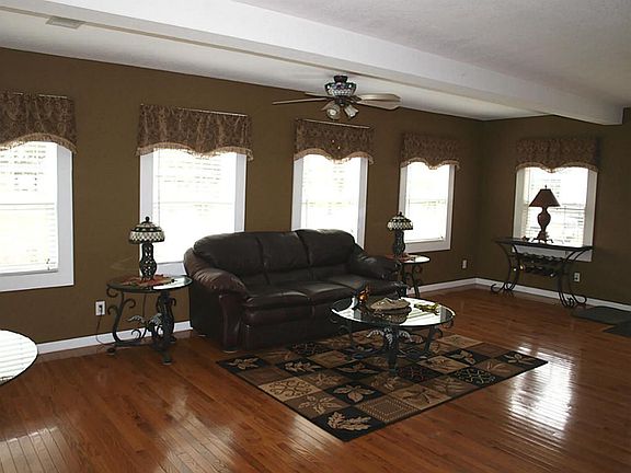 Living room with beautiful wood floors and plenty of natural light