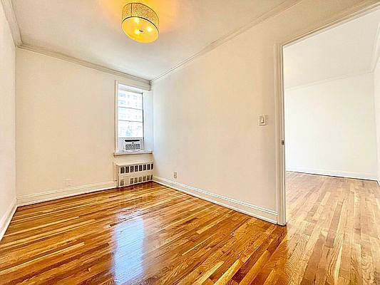 4th image of 412 E 50th St APT 4A