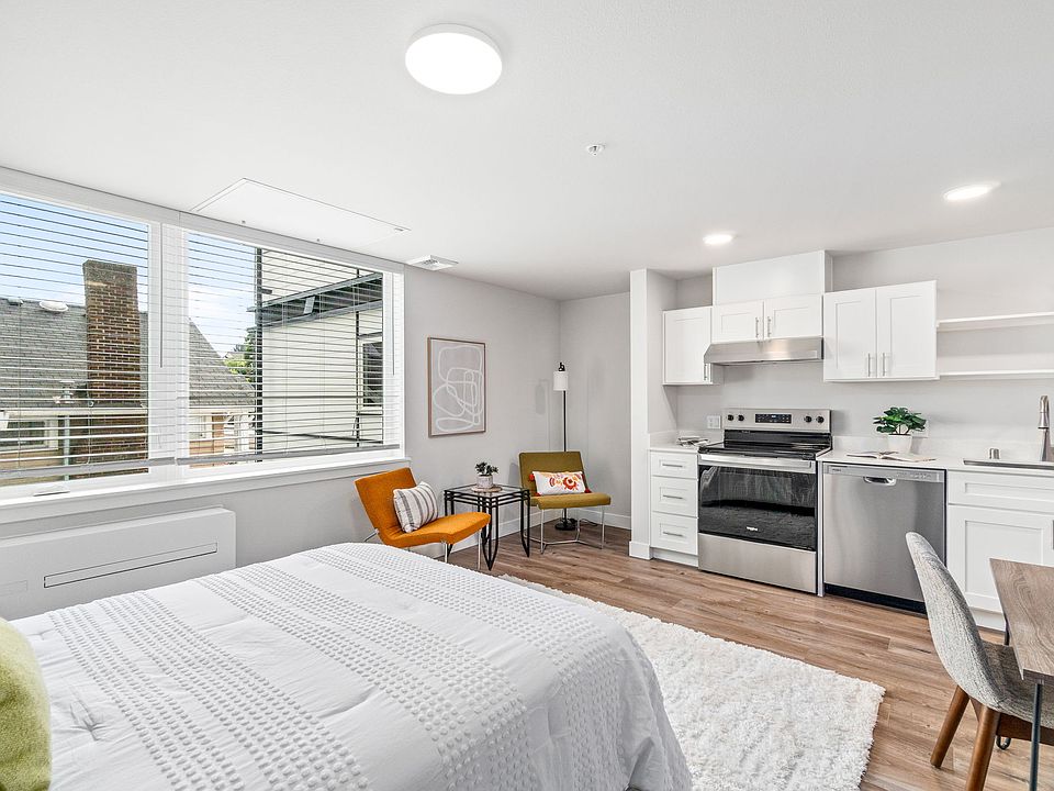Living area and kitchen staged