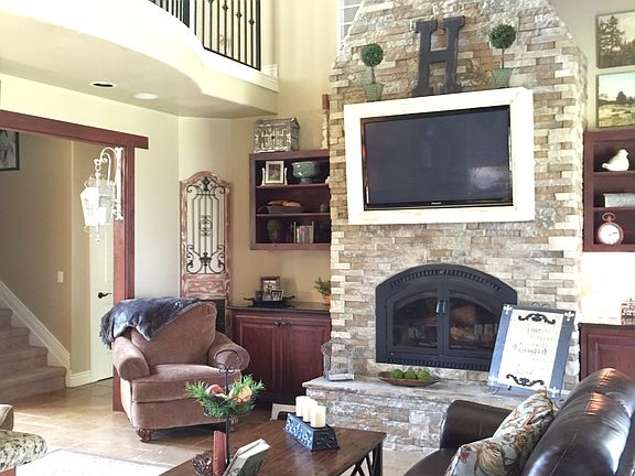Living room with loft above