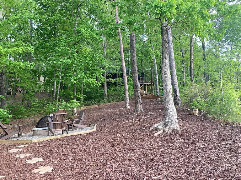 View from fire pit area leading up to the cabin.