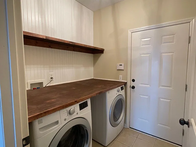 Laundry room with washer and dryer