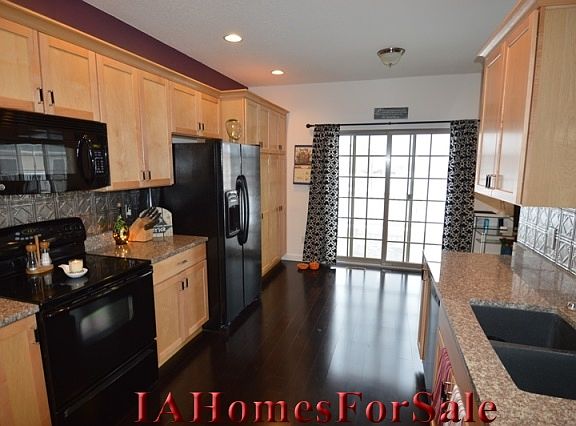 Kitchen with sliding doors that lead to the deck