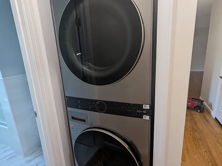 Brand new in-unit smart washer/dryer.