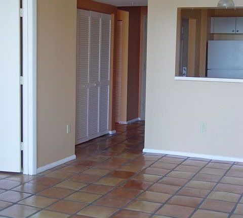 Facing kitchen, bedroom on left. Saltillo tile throughout.