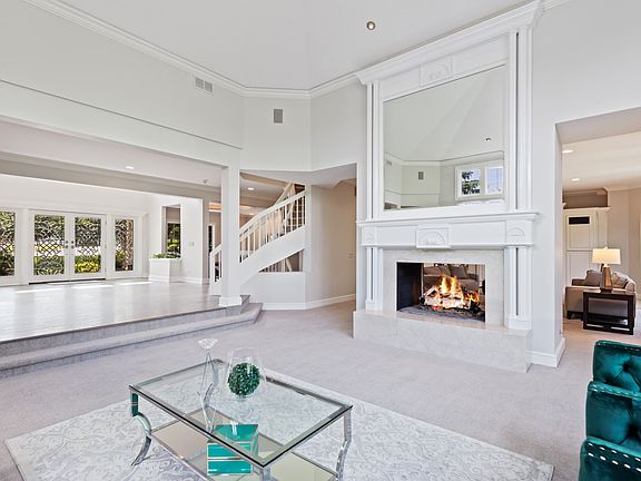 Living Room View to Foyer & Sprial Staircase