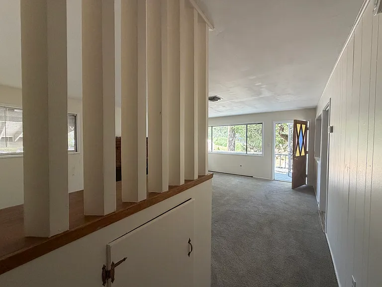 View from hallway to entry.