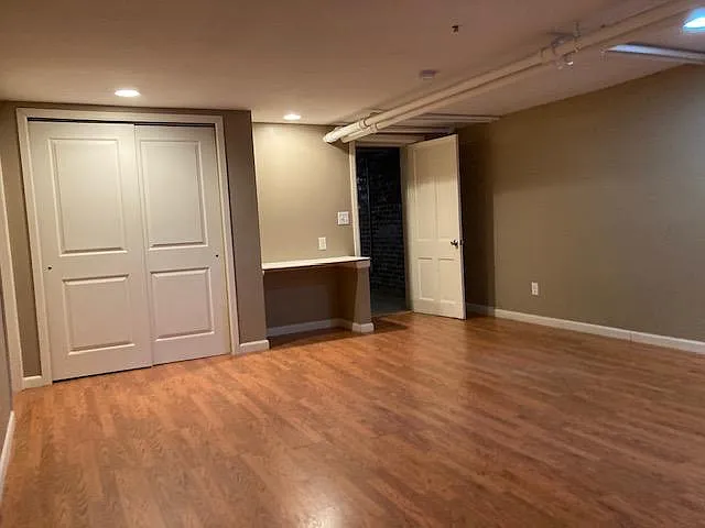 LR - SW. Closet on left and door to BR on Rt.