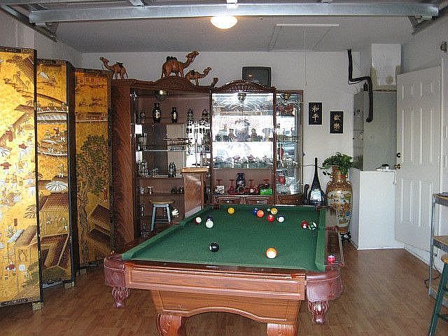 Garage converted into entertainment room....Complete with hardwood floors.