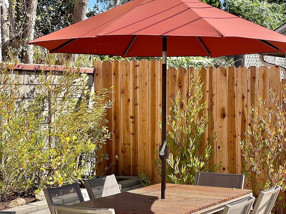 Private garden with furnished patio. Table comfortably seats six.