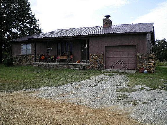 Cozy outdoor living at this single home dwelling. Features 2BR, 2 Bath, wood burning fireplace, refrigerator, oven, cook top, dishwasher, washer & dry hookup, propane heat & air, large attached back deck. No land is included! Just the front & back yard.