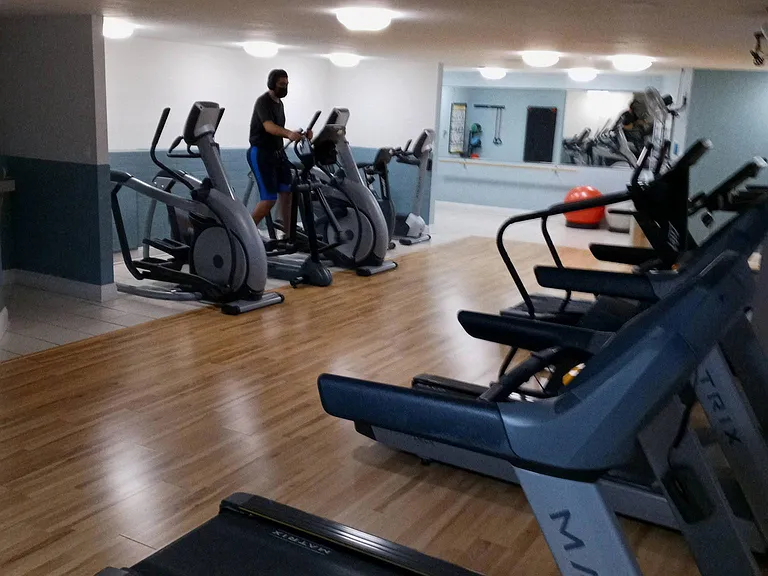 Additional work out room with cardio exercise equipment and dance studio.