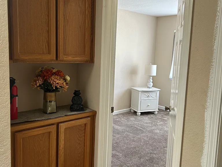access to room next to this one with hardwood floor