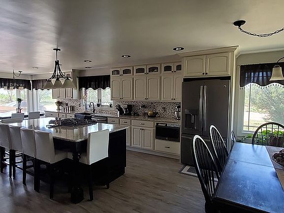 Renovated kitchen seats 24