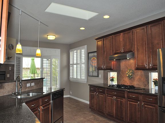 skylight, granite, stainless appliances