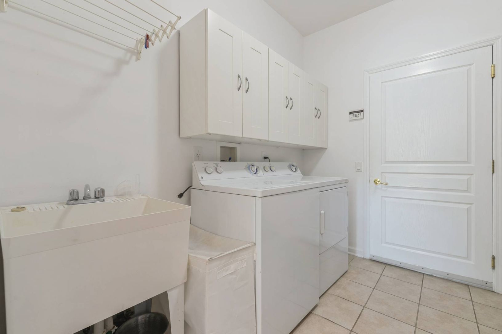  Laundry Room with Sink & Garage Entry
