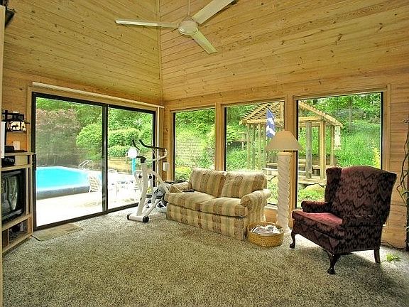 Den with sliders to pool